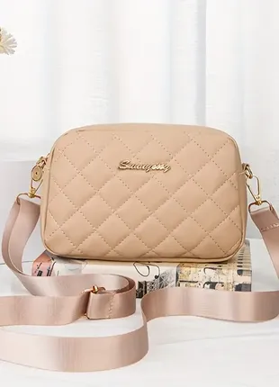 Сумка бежева через плече на ремні