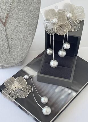 Сережки родій, цвяшки гвоздики, квітка знімається