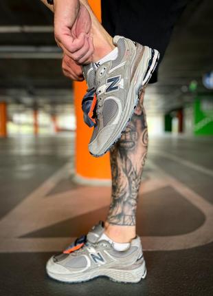 New balance 2002r "grey brown pouch"