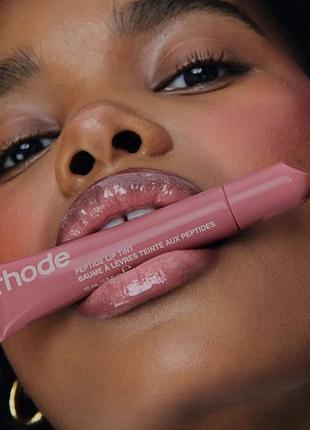 Rhode peptide lip tint salty tan блиск тінт для губ від хейлі бібер