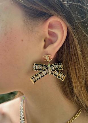 Брендові сережки бантики в позолоті з камінцями