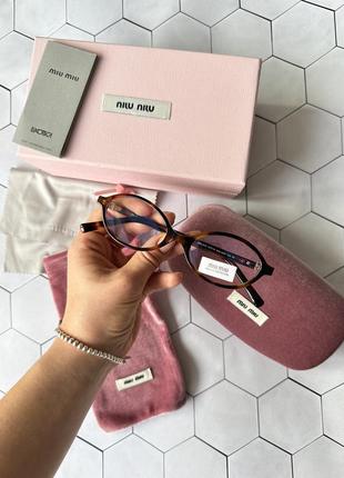 Прозорі іміджеві окуляри miu miu