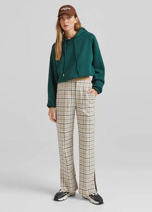 Новые широкие брюки в клетку с разрезами bershka