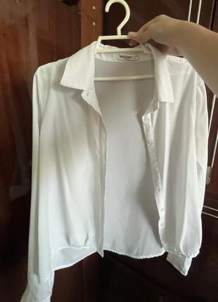 Біла блуза