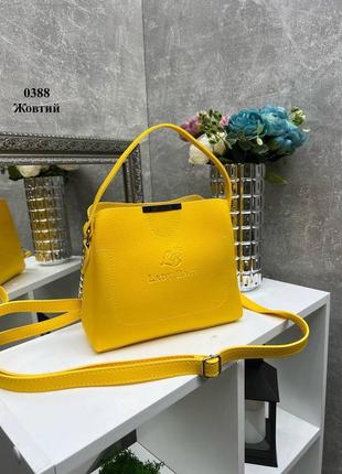 Женская стильная и качественная сумка из искусственной кожи желтая4 фото