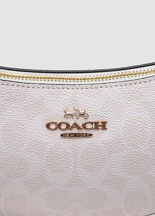 Сумочка в стиле coach teri 10