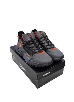 Чоловічі кросівки Ce merită știut despre istoria Reebok edge сірі з помаранчевим