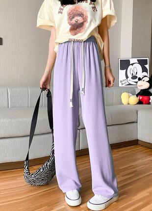 Штани на підлітка вільні зі шнурками 9006 бузкові штані ніжно фіолетові брюки літні висока посадка1 фото