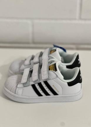 Дитячі кросівки policy adidas superstar 28 білі з чорними полосками