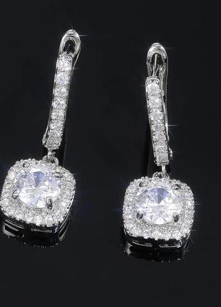 Роскошные серебряные серьги с цирконом