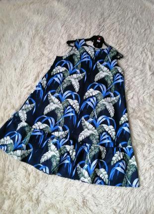 Платье стрейчка тон с воланом фасон разлетайка тропический принт размеры m l xl цвета чёрный синий и8 фото