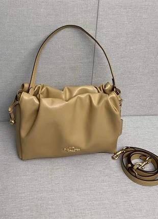 Кожаная сумка coach