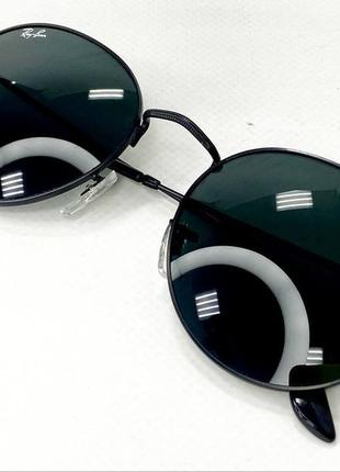 Окуляри сонцезахисні унісекс rayban круглі в тонкій чорній металевій оправі5 фото