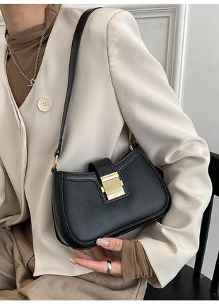 Нова маленька сумочка на плече с золотистою фурнітурою7 фото