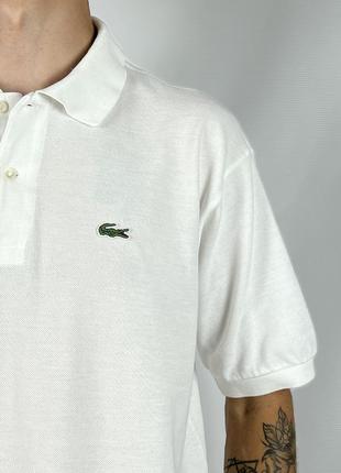 Белоснежное поло с логотипом от lacoste