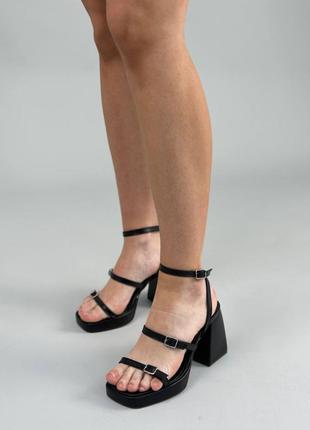 Босоніжки жіночі шкіряні чорного кольору на товстому підборі2 фото