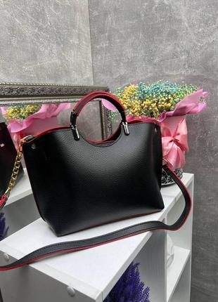 Жіноча стильна та якісна сумка зі штучної шкіри чорна з червоним5 фото