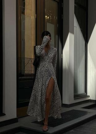 Элегантное платье миди рукава манжеты клеш с разрезом платье белая с принтом зебра макси длинная весенняя трендовая стильная1 фото