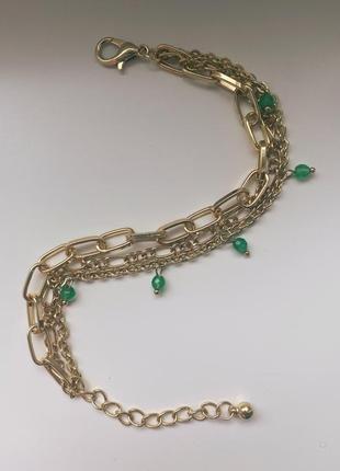 Золотий браслет із нержавіючої сталі у вигляді ланцюгів із зеленими намистинами3 фото