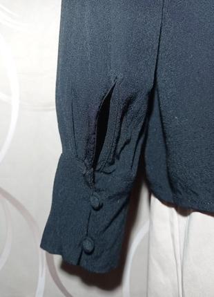 Трендовая блуза черного цвета с завязками бантом5 фото