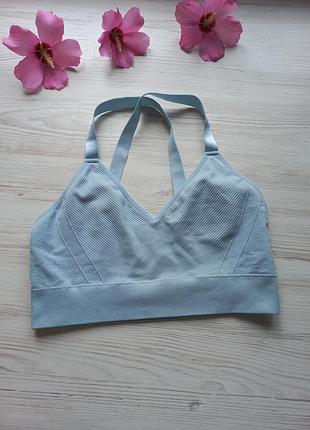 Топ з мікрофібри на регульованих брителях