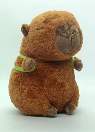 М'яка іграшка shantou "капібара" (23 см) коричнева, з рюкзачком авокадо 98766-97