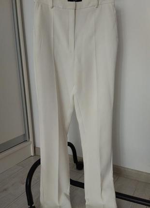 Белые классические брюки с высокой посадкой mango производство вьетнам