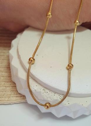 Женская цепочка с шариками позолота