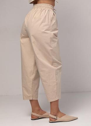 Жіночі штани-банани з кишенями — бежевий колір, m (є розміри)2 фото
