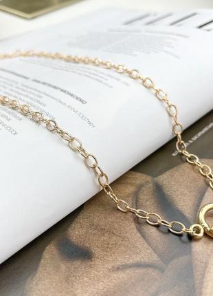 Золотая плетеная подвеска с оригинальным замком