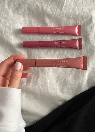 Блиск для губ clarins instant natural light lip perfector.