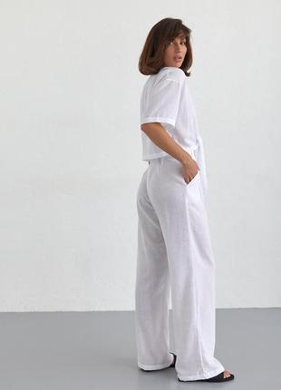 Жіночий літній костюм зі штанами та блузкою на зав'язках — білий колір, l (є розміри)2 фото