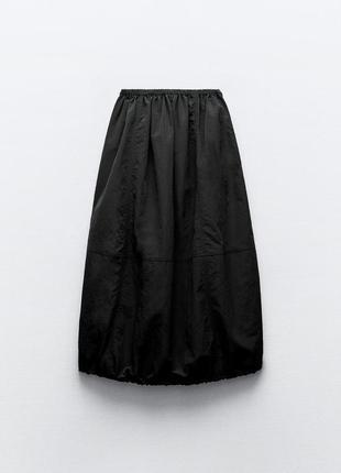 Нейлоновая юбка-балон средней длины5 фото
