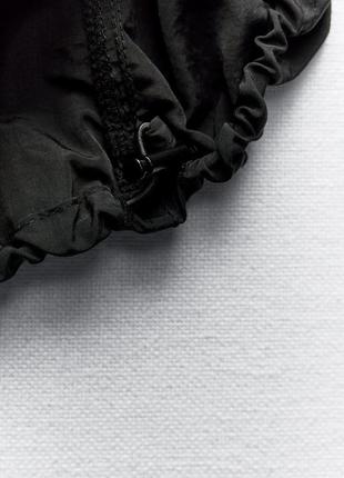 Нейлоновая юбка-балон средней длины7 фото