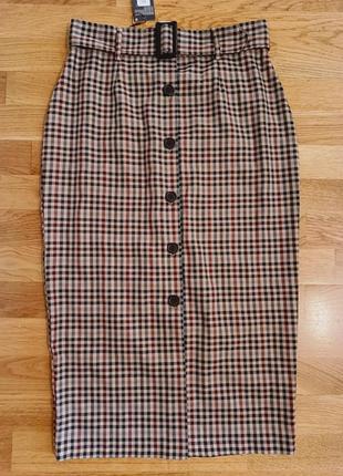Класна спідничка міді в клітинку на гудзиках