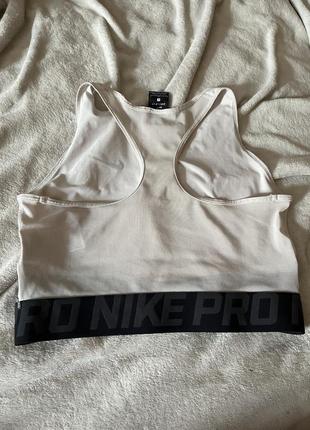 Спортивний топ nike pro intertwist3 фото