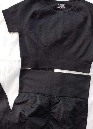 Спортивний костюм хс новий чорний жіночий топ лосіни легінси3 фото