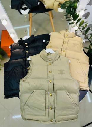Є відео жилетка в стилі celine чорна беж хакі глянець