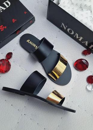 Nomad оригінал шкіряні чорно-золотисті сандалії