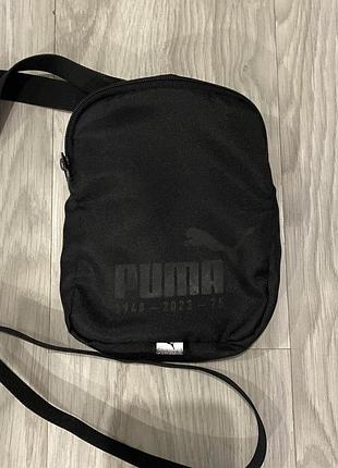 Черная сумка через плечо бренда puma