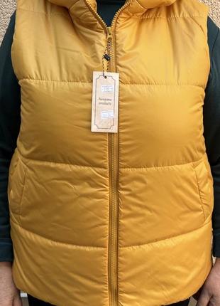 Жіноча жилетка