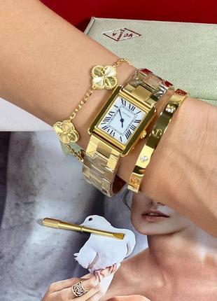 Часы наручные женские золотистые брендовые в стиле часы cartier tank