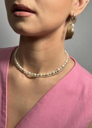 Сережки з натуральними перлинами у срібному кольорі.