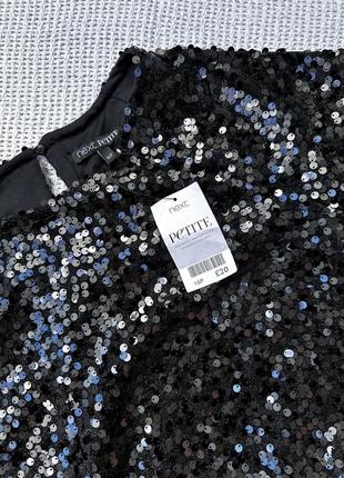 Блузка в паєтках