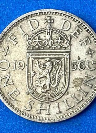 Монета великобритании 1 шиллинг 1953-66 гг.1 фото