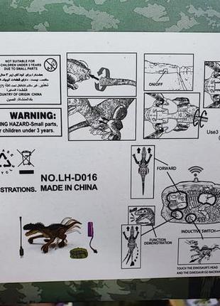 Іграшка робот динозавр на радіокеруванні зі звуковими та світловими ефектами на акумуляторі4 фото