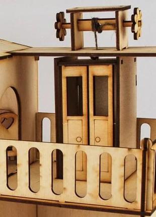 Дерев'яний іграшковий 3d-конструктор зірка будиночок із ліфтом4 фото