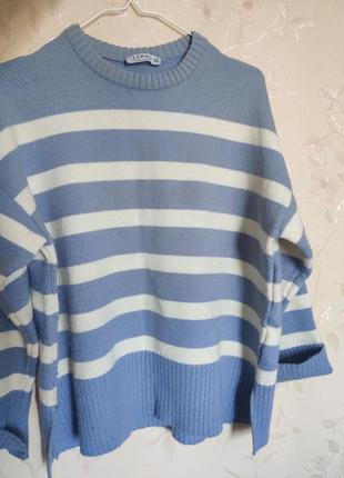 Светр блакитний у смужку жуночий