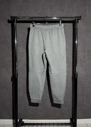 Чоловічі спортивні штани nike dri-fit tapered m6 фото