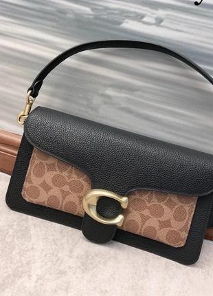 Сумка в стилі коуч coach